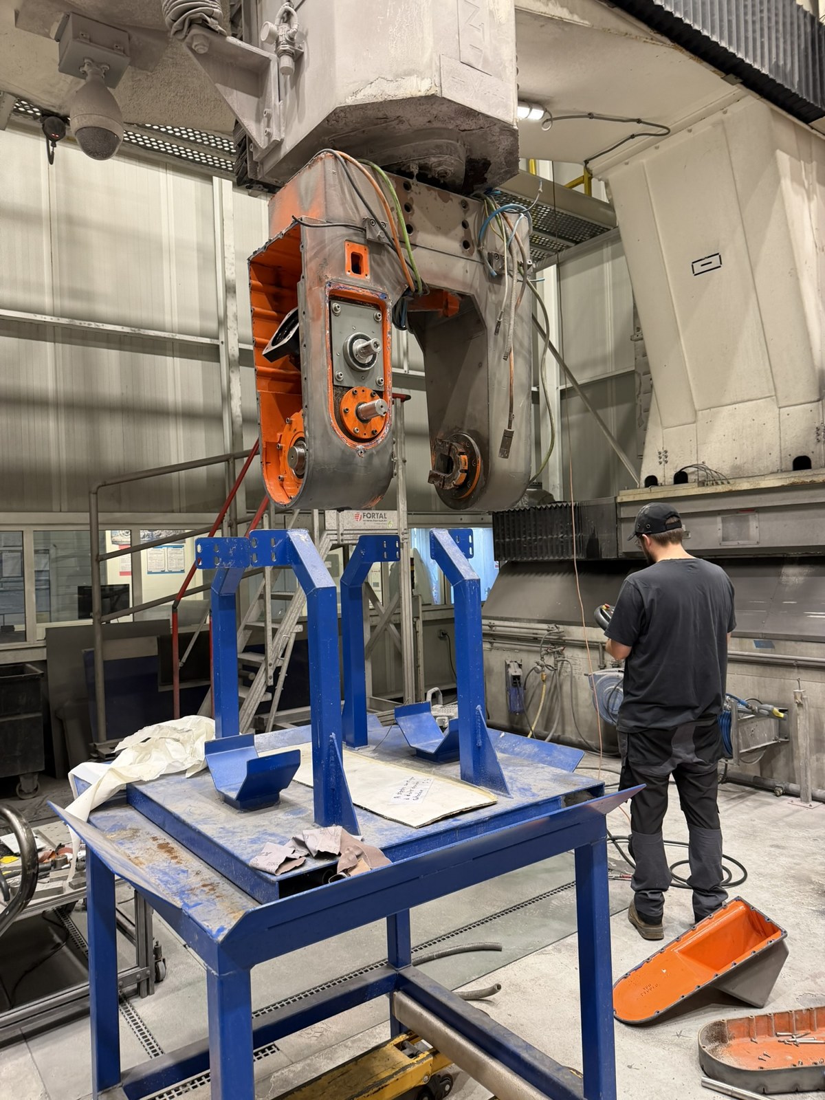 6-sense-automation engineer working on the cutting head