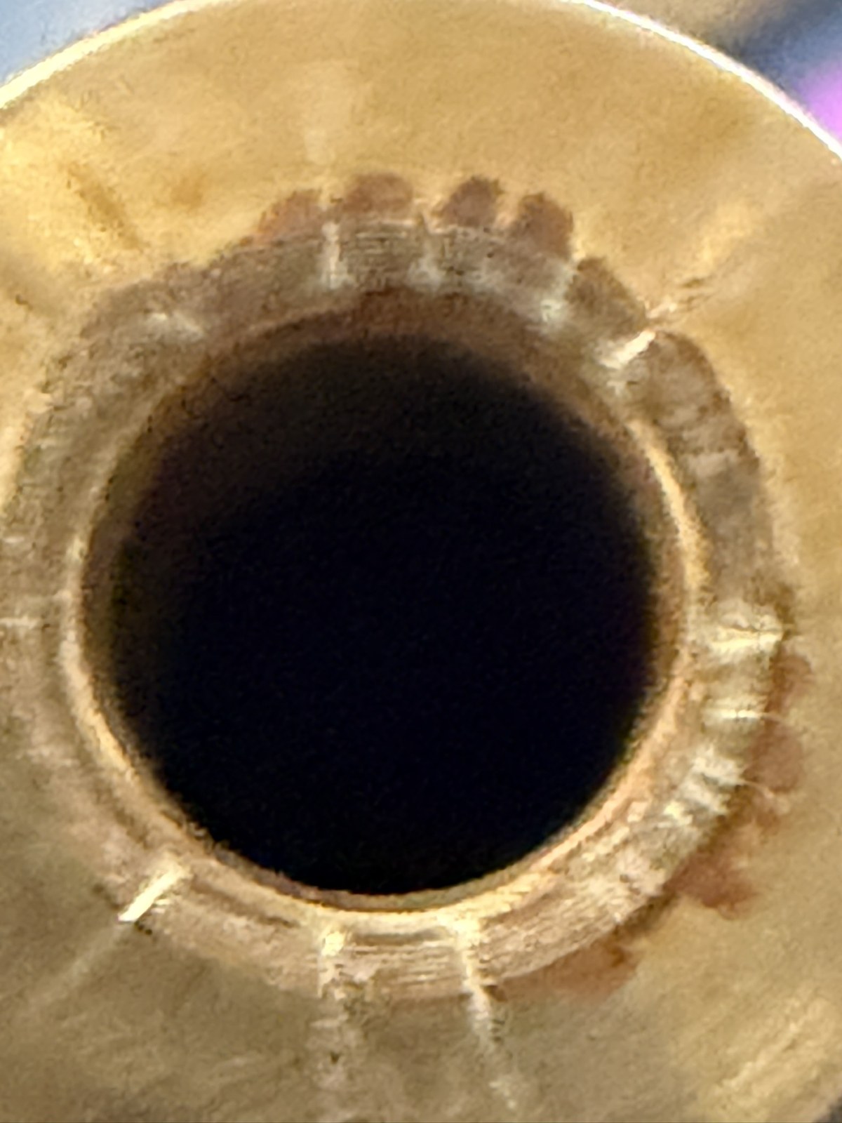 Worn waterjet nozzle bore after thousands of operating hours